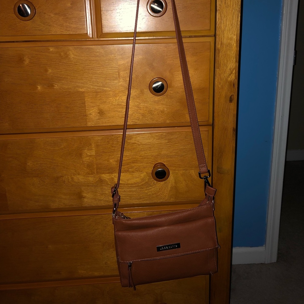 A brown leather purse
